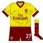 2010-11:
A yellow away strip returned in 2010 and against Blackpool one might have expected the navy kit to be utilised. Instead, the only change was that special redcurrant socks were unveiled. The colour-clash didn't seem to bother Arsenal, who won 2-1.