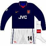 1998-99:
For the Champions League, Arsenal were drawn with Lens, whose red and yellow stripes clashed with both of the Gunners' kits. When the sides met at Wembley, a one-off navy shirt, with home shorts and home change socks, was worn.